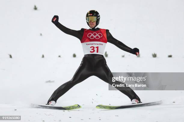 Michael Hayboeck of Austria reacts at the finish after he makes a jump during the Ski Jumping - Men's Large Hill on day eight of the PyeongChang 2018...