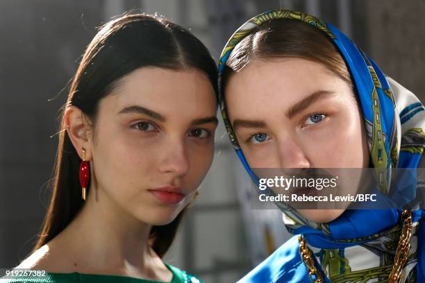 Models backstage ahead of the Toga show during London Fashion Week February 2018 on February 17, 2018 in London, England.