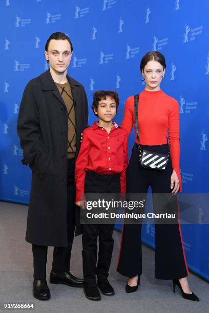 Franz Rogowski, Lilien Batman and Paula Beer pose at the 'Transit' photo call during the 68th Berlinale International Film Festival Berlin at Grand...