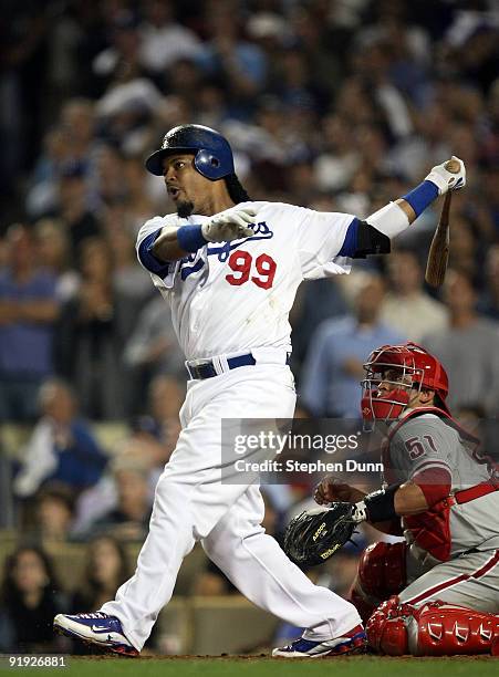 Manny Ramirez of the Los Angeles Dodgers hits a two run home run in the bottom of the fifth inning off of pitcher Cole Hamels of the Philadelphia...