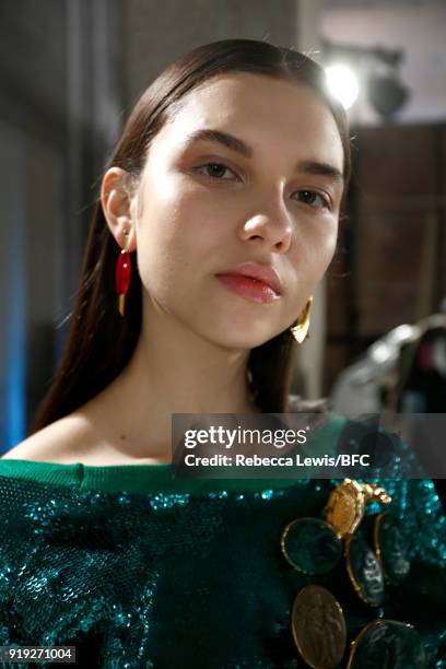 Model backstage ahead of the Toga show during London Fashion Week February 2018 on February 17, 2018 in London, England.