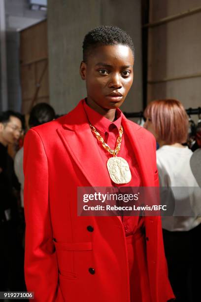 Model backstage ahead of the Toga show during London Fashion Week February 2018 on February 17, 2018 in London, England.