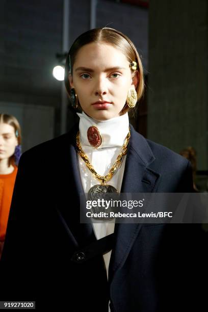 Model backstage ahead of the Toga show during London Fashion Week February 2018 on February 17, 2018 in London, England.