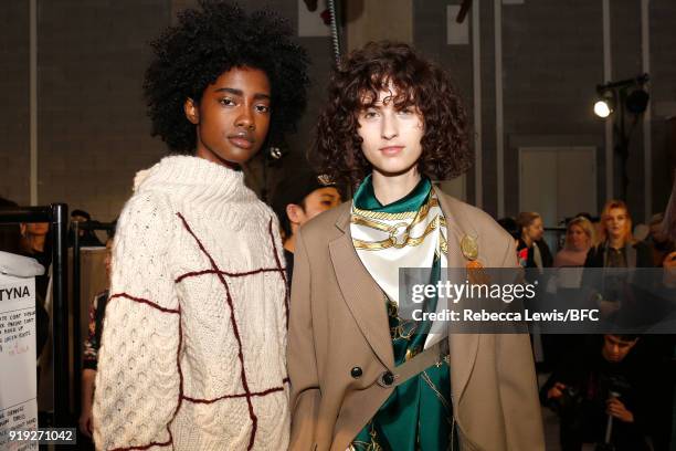 Models pose backstage ahead of the Toga show during London Fashion Week February 2018 on February 17, 2018 in London, England.