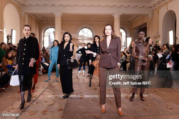 Models pose at the Dorateymur Presentation during London Fashion Week February 2018 at Somerset House on February 17, 2018 in London, England.