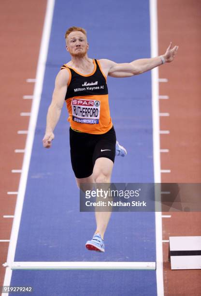 Greg Rutherford competes in the Mens Long jump during the SPAR British Athletics Indoor Championships at Arena Birmingham on February 17, 2018 in...