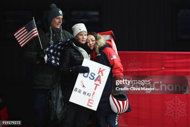 Katie Uhlaender of the United States is consoled the Women's Skeleton on day eight of the PyeongChang 2018 Winter Olympic Games at Olympic Sliding...