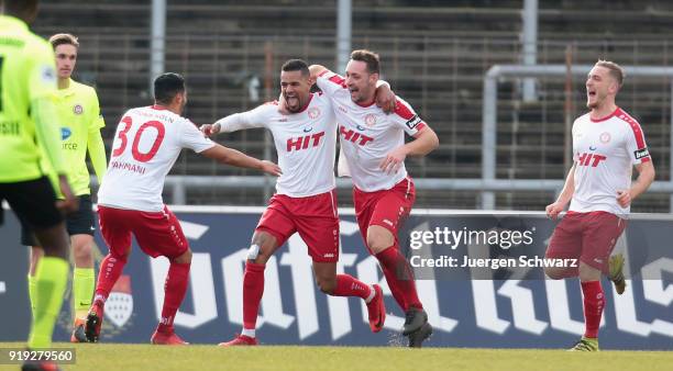 Hamdi Dahmani of Cologne , Daniel Keita-Ruel and Robin Scheu celebrate after scoring during the 3. Liga match between SC Fortuna Koeln and SV Wehen...