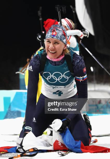 Anastasiya Kuzmina of Slovakia celebrates winning the gold medal during the Women's 12.5km Mass Start Biathlon on day eight of the PyeongChang 2018...