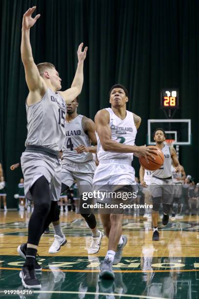 Cleveland State Vikings Anthony Wright drives to the basket as Oakland Golden Grizzlies guard/forward Chris Palombizio defends during the second half...