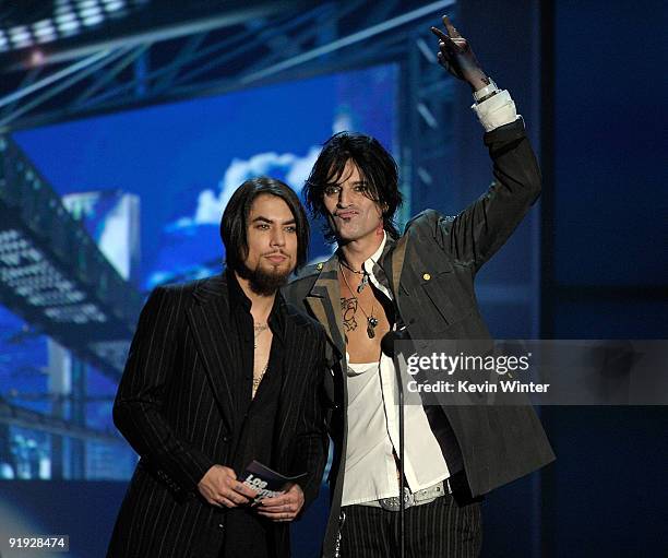 Musicians Dave Navarro and Tommy Lee present the Mejor Artista Rock award onstage at the "Los Premios MTV 2009" Latin America Awards held at Gibson...