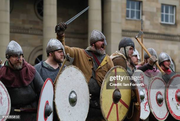 Re-enactors representing the rival armies of the Vikings and Anglo-Saxons skirmish in York during the Jorvik Viking Festival on February 17, 2018 in...