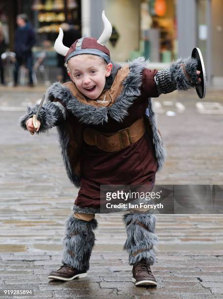 Jack Pearson from Scarborough gets into character as he dresses as a Viking during the Jorvik Viking Festival on February 17, 2018 in York, England....