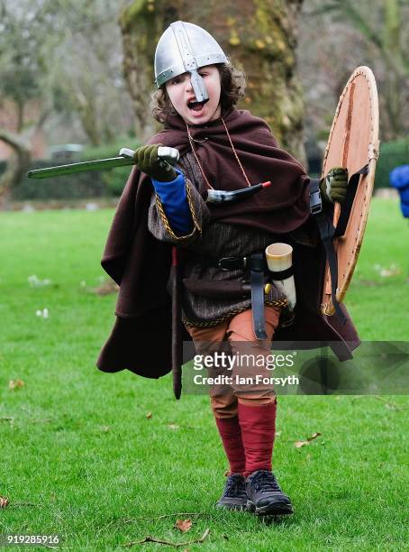 Lukas Exelby-Townsend from Northallerton reacts to the camera as he joins other re-enactors representing the rival armies of the Vikings and...