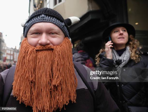 Members of the public line the streets as re-enactors representing the rival armies of the Vikings and Anglo-Saxons prepare to march through York...