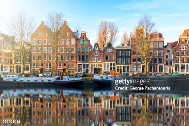 morning reflections in amsterdam, holland - amsterdam stock pictures, royalty-free photos & images