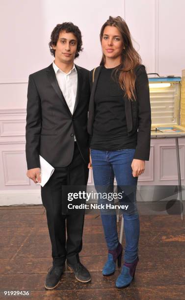 Alex Dellal and Charlotte Casiraghi attend the opening night of 'The Embassy' exhibition at 33 Portland Place on October 15, 2009 in London, England.