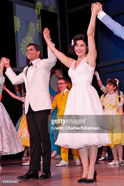 Actors John Stamos and Gina Gershon perform during the opening night of "Bye Bye Birdie" on Broadway at the Henry Miller's Theatre on October 15,...