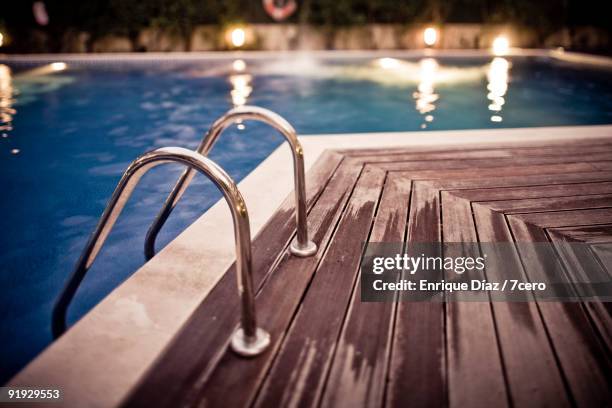 swimming pool - 7cero stock pictures, royalty-free photos & images