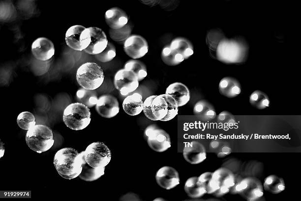 bubbles glowing in mid air - brentwood tennessee stock pictures, royalty-free photos & images