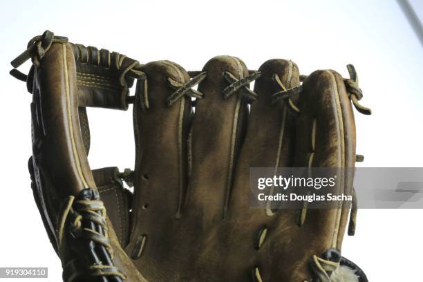 baseball leather glove on a white background - softball glove stock pictures, royalty-free photos & images