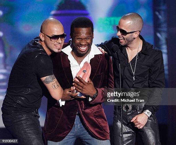 Rappers Wisin & Yandel with 50 Cent onstage during the "Los Premios MTV 2009" - Latin America Awards held at Gibson Amphitheatre on October 15, 2009...
