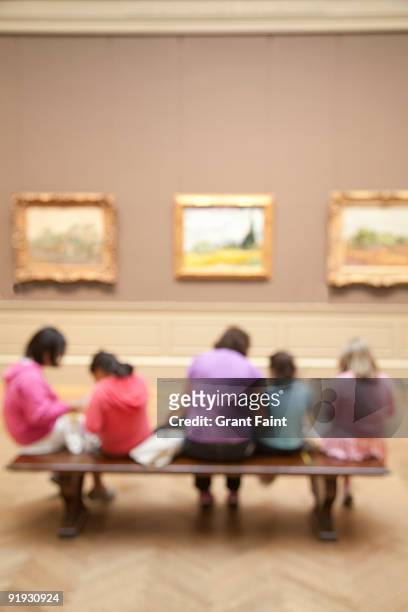 children with teacher observing in art museum - bokeh museum stock pictures, royalty-free photos & images
