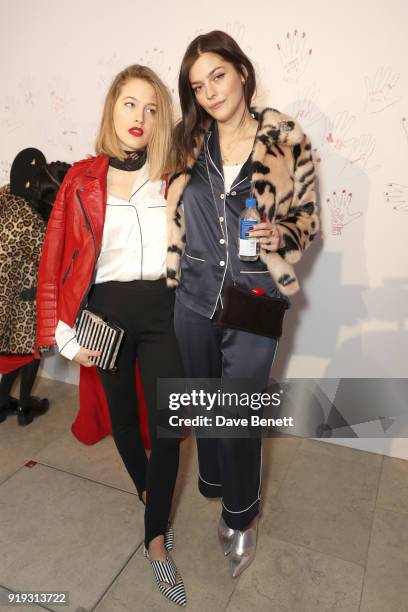 Tess Ward and Amber Anderson attend the Lulu Guinness AW18 London Fashion Week presentation on February 17, 2018 in London, England.