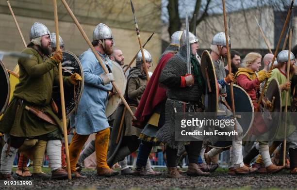 Re-enactors representing the rival armies of the Vikings and Anglo-Saxons skirmish in York during the Jorvik Viking Festival on February 17, 2018 in...