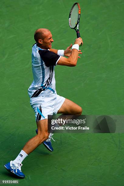 Nikolay Davydenko of Russia returns a shot against Radek Stepanek of the Czech Republic during day six of 2009 Shanghai ATP Masters 1000 at Qi Zhong...