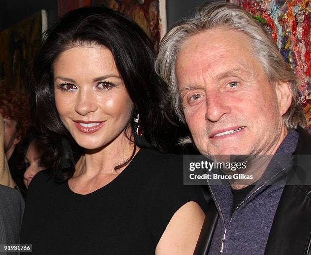 Catherine Zeta Jones and Michael Douglas pose backstage at "Chita Rivera...And Now I Swing" at the Birdland Jazz Club on October 15, 2009 in New York...