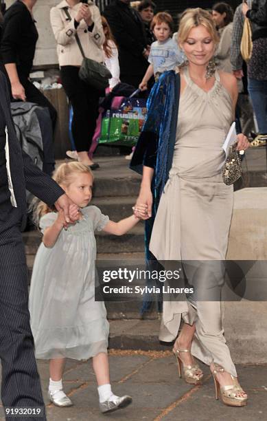 Kate Moss and her daughter attend Leah Wood and Jack Macdonald's wedding at Southwark Cathedral on June 21, 2008 in London, England.