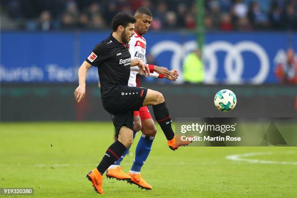 Kevin Volland of Bayer Leverkusen (l9 fights for the ball with Walace of Hamburg during the Bundesliga match between Hamburger SV and Bayer 04...