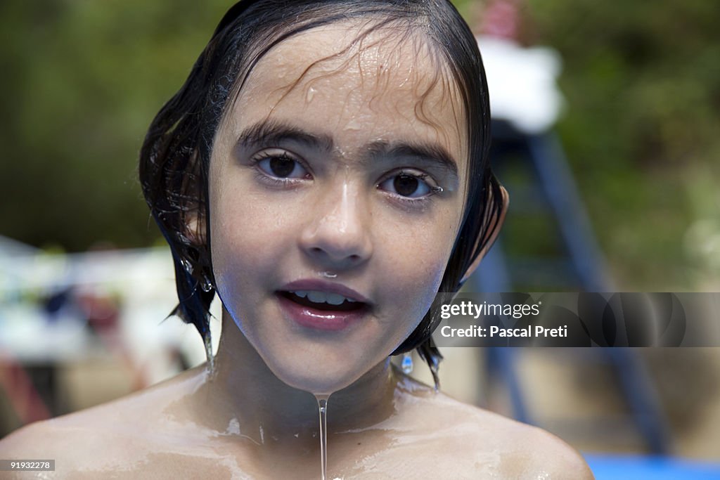 CLOSE UP OF A WET GIRL FACE