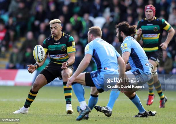 Luther Burrell of Northampton Saints offloads the ball during the Aviva Premiership match between Northampton Saints and London Irish at Franklin's...