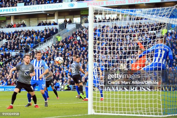 Jonson Clarke-Harris of Coventry City sees his headed effort saved by Tim Krul of Brighton and Hove Albion during the FA Cup Fifth Round match...