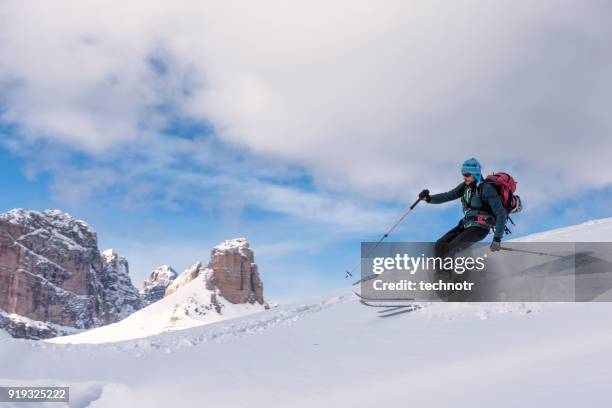 giovane sciatore in dolomiti - sci alpinismo foto e immagini stock