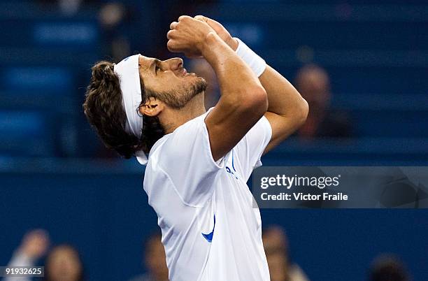 Feliciano Lopez of Spain celebrates match point against Robin Soderling of Sweden during day six of 2009 Shanghai ATP Masters 1000 at Qi Zhong Tennis...