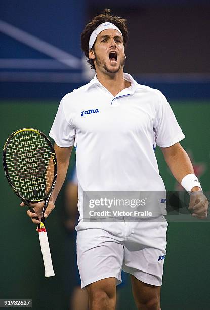 Feliciano Lopez of Spain celebrates a point against Robin Soderling of Sweden during day six of 2009 Shanghai ATP Masters 1000 at Qi Zhong Tennis...