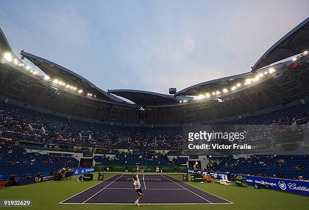 Robin Soderling of Sweden serves against Feliciano Lopez of Spain during day six of 2009 Shanghai ATP Masters 1000 at Qi Zhong Tennis Centre on...