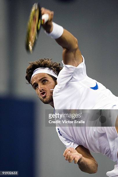 Feliciano Lopez of Spain serves against Robin Soderling of Sweden during day six of 2009 Shanghai ATP Masters 1000 at Qi Zhong Tennis Centre on...