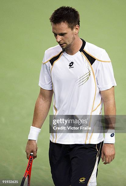 Robin Soderling of Sweden reacts to a lost point against Feliciano Lopez of Spain during day six of 2009 Shanghai ATP Masters 1000 at Qi Zhong Tennis...