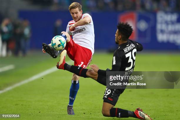 Andre Hahn of Hamburg fights for the ball with Benjamin Henrichs of Bayer Leverkusen during the Bundesliga match between Hamburger SV and Bayer 04...