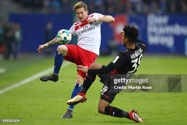 Andre Hahn of Hamburg fights for the ball with Benjamin Henrichs of Bayer Leverkusen during the Bundesliga match between Hamburger SV and Bayer 04...