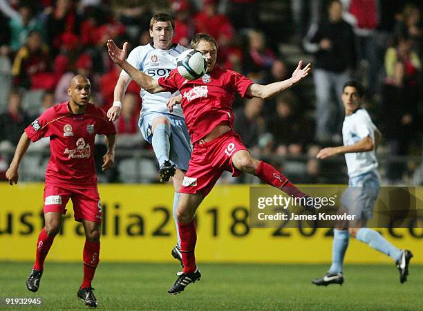 Sebastian Ryall of Sydney and Adam Hughes of United compete for the ball during the round 11 A-League match between Adelaide United and Sydney FC at...