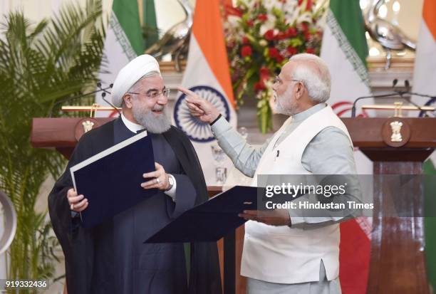 Iran President Dr. Hassan Rouhani with PM Narendra Modi after releasing commemorative stamp at Hyderabad House, on February 17, 2018 in New Delhi,...