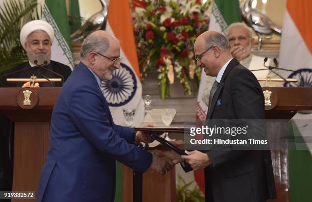 Vijay Gokhale, Foreign Secretary with H.E. Gholamreza Ansari, Ambassador of Iran exchange an agreement in the presence of Iran President Dr. Hassan...