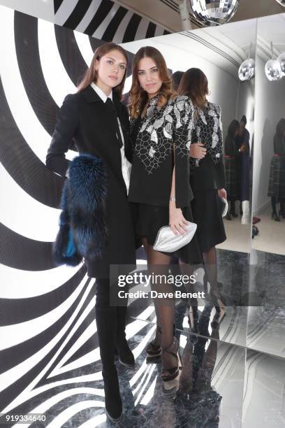 Sabrina Percy and Amber Le Bon attend the Lulu Guinness AW18 London Fashion Week presentation on February 17, 2018 in London, England.