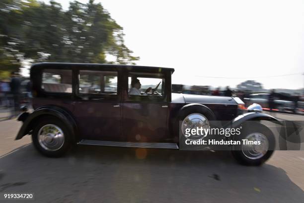 People participate during the 21 Gun Salute Vintage Car Rally at India Gate, on February 17, 2018 in New Delhi, India. Over 125 vintage cars & 35...