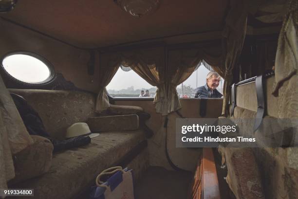 Visitor at the rally seen through the interiors of a vintage car on display during the 21 Gun Salute Vintage Car Rally at India Gate, on February 17,...